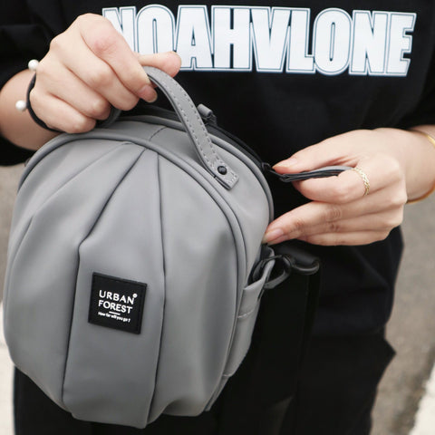 Urban Forest Beetle Mini SkinTouch torbica, siva, ručno nošenje prilagodljivi volumen